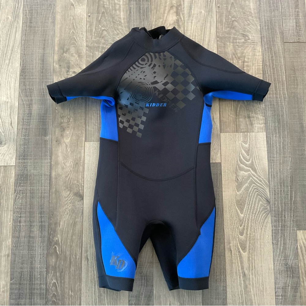Kidder Neoprene Shorty Wetsuit 
Surf Scuba 
Size Juniors 10 
Black Royal Blue